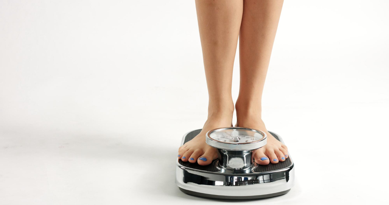 woman on weighing scale